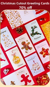Detail of 3D Christmas cards with gold foil patterns and festive cutouts on red background