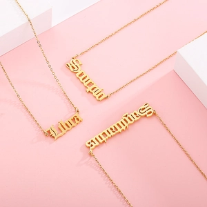 Three gold 18k plated zodiac necklaces featuring Scorpio, Libra and Sagittarius pendants