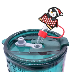Christmas penguin straw topper on green tumbler cup with 10mm dust plug decoration