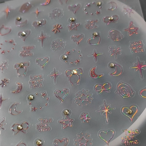 Holographic 5D embossed Christmas nail stickers with stars, bows and rhinestones