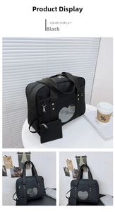 Close-up of black Japanese Ita bag with transparent heart-shaped window and small purse