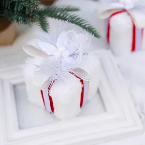 Plush white Christmas gift box ornament with faux fur, silk bow and berry details