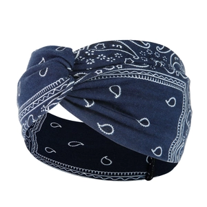 Close-up of navy blue paisley pattern on soft elastic yoga headband with vintage prints