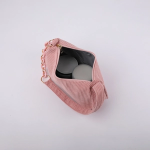 Pink corduroy shoulder bag for women with decorative chain and zip closure