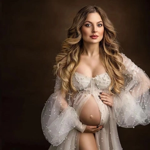 White tulle maternity photography gown with pearls and puff sleeves for photo shoots