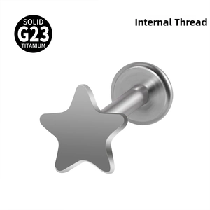Macro view of G23 titanium five-pointed star stud with internal thread design