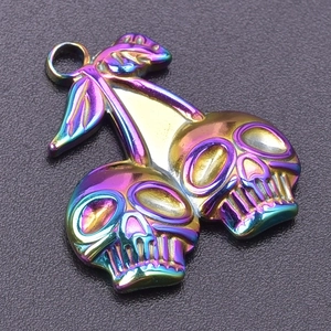 Detailed macro of rainbow electroplated skull cherry pendant with metallic luster