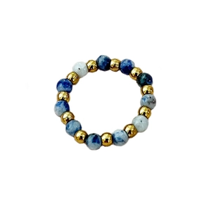 Handmade elastic beaded ring featuring natural blue marble stones and gold steel beads