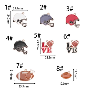 Detailed view of American football themed enamel charms with various sizes and helmet designs