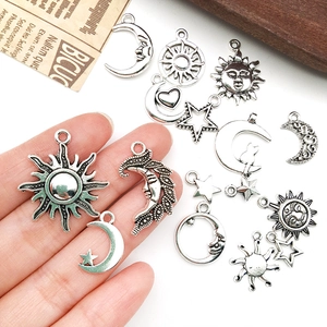 Vintage silver alloy celestial pendants with sun moon and star designs for DIY jewelry