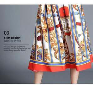 Detail of flared dress hem with baroque chain print and elegant red border trim