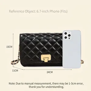Black quilted crossbody bag with gold chain strap and metal lock, size 24x15x11cm