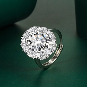 Macro detail of silver halo ring with a large round cubic zirconia and adjustable band