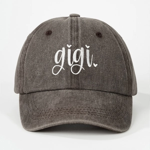 Distressed dark grey washed cotton baseball cap with white cursive gigi embroidery