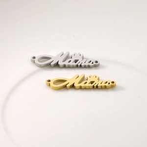 Macro detail of gold and silver Mama crown connectors for DIY jewelry making