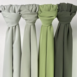 Elegant pleated satin chiffon scarves in a palette of various green tones for women