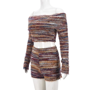 Close-up of multicolored fuzzy knit fabric texture on long sleeve off-shoulder crop top