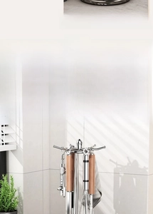 Rotating stainless steel kitchen organizer with a functional 6-hook design for utensils