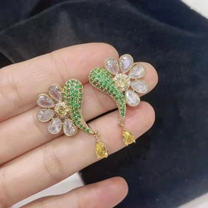 Floral dangle earrings with green leaves and yellow teardrop crystals for women