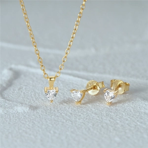 Detail shot of the S925 hallmark on heart-shaped silver necklace and earrings set