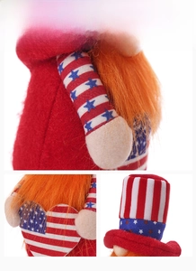 Detailed view of Patriotic July 4th Gnome plush with striped hat and star patterns