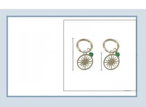 Detail view of 18K gold plated stainless steel sunburst earrings with natural stone