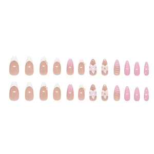 Press-on nails with 3D carved lily flowers, gradient pearls, and elegant French almond shape