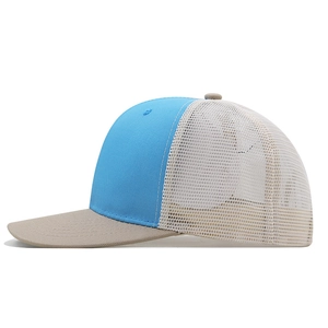 Side view of sky blue and cream breathable mesh trucker hat with khaki curved brim