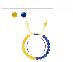 Detail of 8mm yellow and blue crystal beads with adjustable braided cord and slider