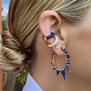 Luxury gold C-shape ear cuffs and hoop earrings set with sparkling blue and clear crystals