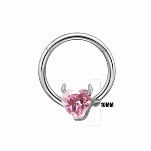 Close-up of pink heart-shaped devil nipple ring with 10mm silver piercing design