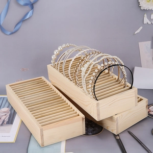 Wooden headband organizer rack with multiple slots for jewelry display and storage