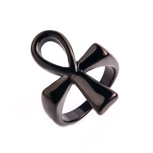Macro shot of polished black stainless steel Ankh cross ring with gothic mystic details