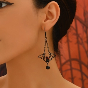 Gothic black bat earrings with red eyes and chain drop for Halloween jewelry aesthetic
