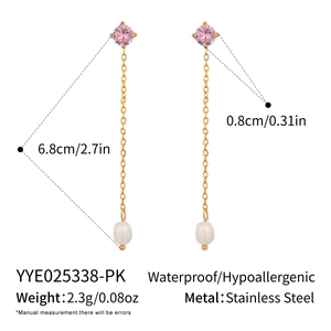 Detail view of pink zircon and pearl tassel earrings with size dimensions and specs
