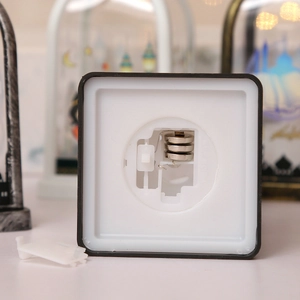 Detail of Christmas lantern base with battery compartment and power toggle switch