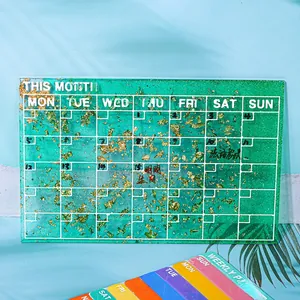 Moule de planning mensuel en résine verte avec feuilles d'or et grille de calendrier