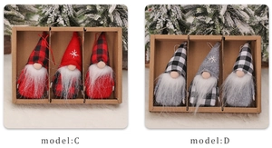 Close-up of Christmas gnome ornaments in red and grey plaid sets with hanging ropes