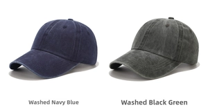 Detail view of washed cotton baseball caps in Navy Blue and Blackish Green colors