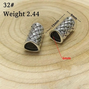 Macro shot of 15mm vintage silver braided metal end caps for DIY jewelry making