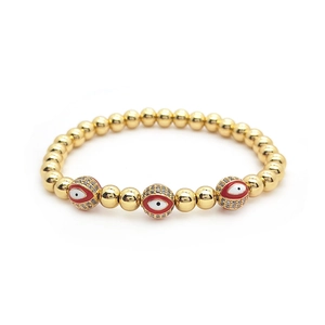 18K gold beaded stretch bracelet featuring three evil eye charms with cubic zirconia