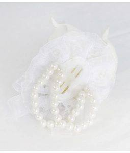 Detail of white organza lace hair claw clip with double rows of elegant pearls