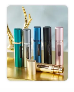 Detail showing various colors of 5ml glass perfume atomizers with clear view window