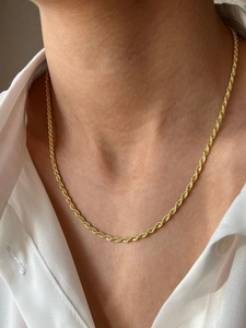 Detail of 18k gold plated rope chain necklace worn on a collarbone for DIY styling