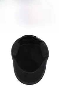 Detail of warm black thick fleece lining inside a grey winter flat cap for men