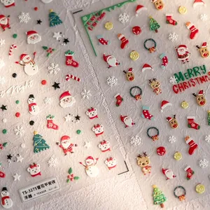 3D embossed Christmas nail stickers featuring Santa, snowflakes, and festive patterns
