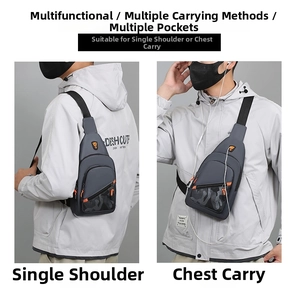 Detail view of multi-pocket dark gray crossbody chest bag with adjustable strap