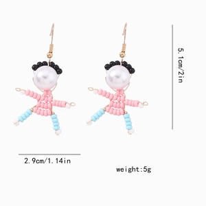 Detail view of handmade beaded figure earrings with dimensions 5.1cm length and 5g weight