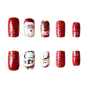 Short square Christmas press-on nails with 3D sweater patterns and Santa reindeer motifs