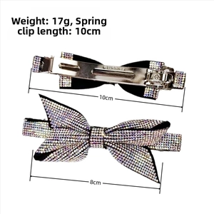 Detail view of crystal bow hair clip showing front and 10cm spring clip back